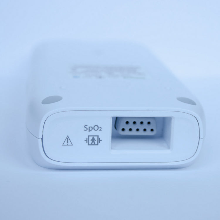 Close-up view of CH-100 pulse oximeter’s SpO₂ sensor port with 9-pin connector socket and warning symbols for compatible sensor use