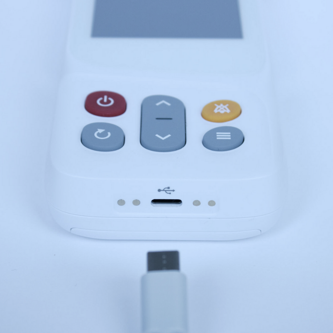 CH-100 Pulse Oximeter by CMI Health with visible USB-C charging port and a Type-C charging cable