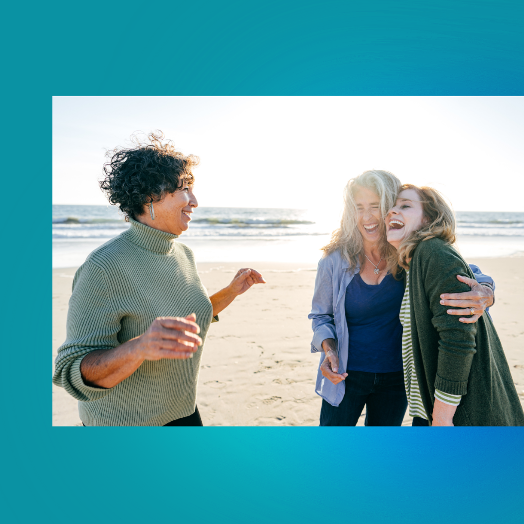 Active older women happily smile and look joyful on the beach